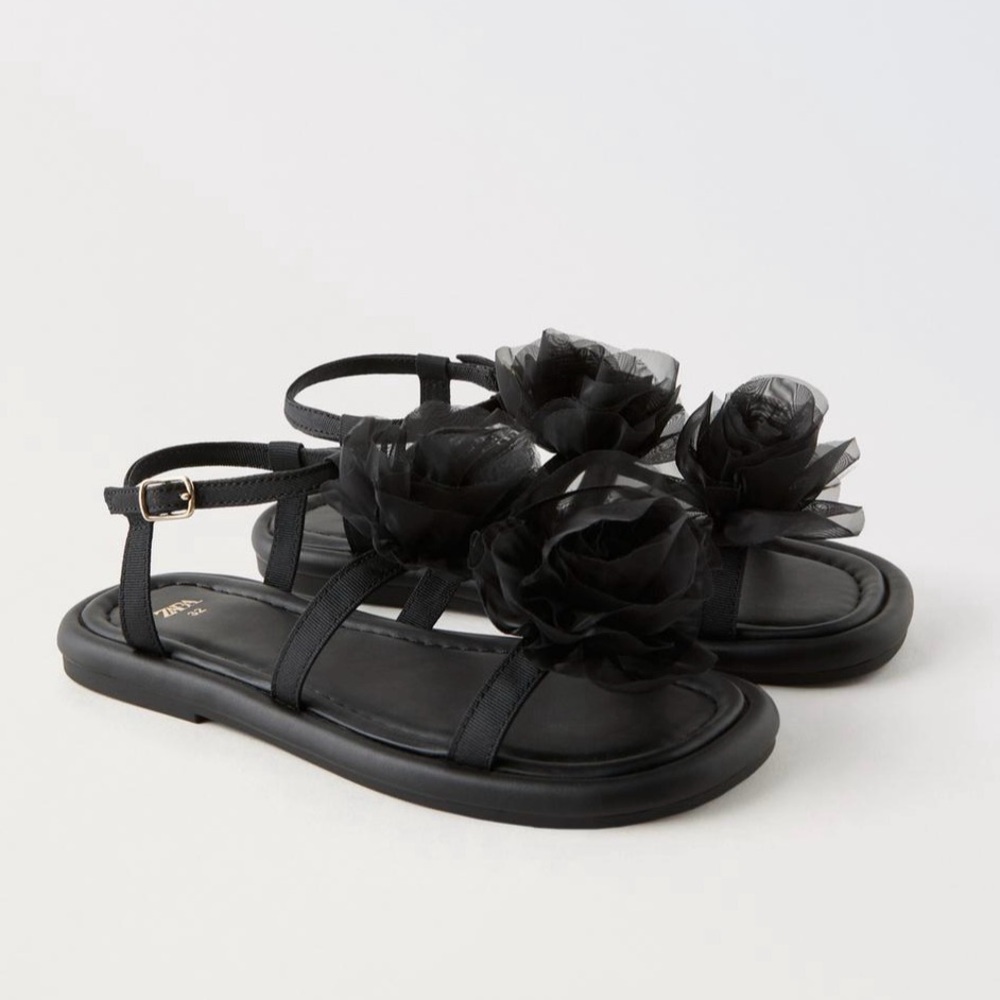 Zara NWT size 12 maxi flowers sandals. Side buckle closure.